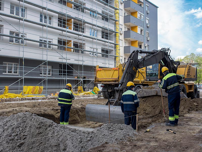 Infrastructure field execution with heavy equipment and site coordination