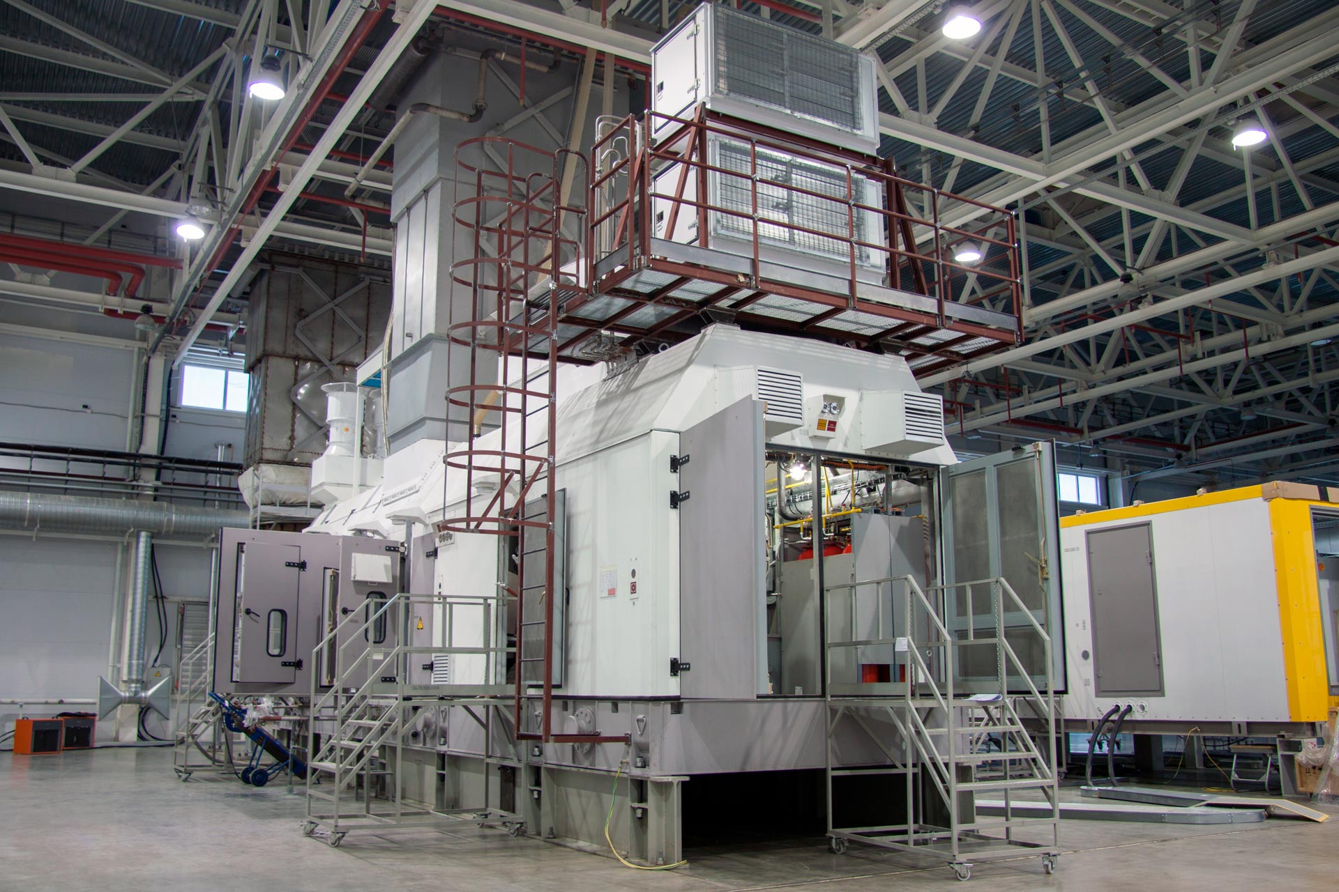Industrial power generation equipment inside a turbine hall
